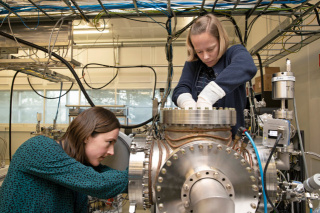 Researchers preparing an EUV material experiment_48562